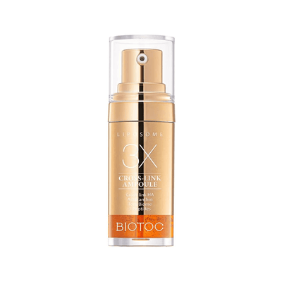 BIOTOC 3X Ampoule skincare serum with astaxanthin, peptides, and collagen in 10.4ml bottle for radiant, youthful skin.